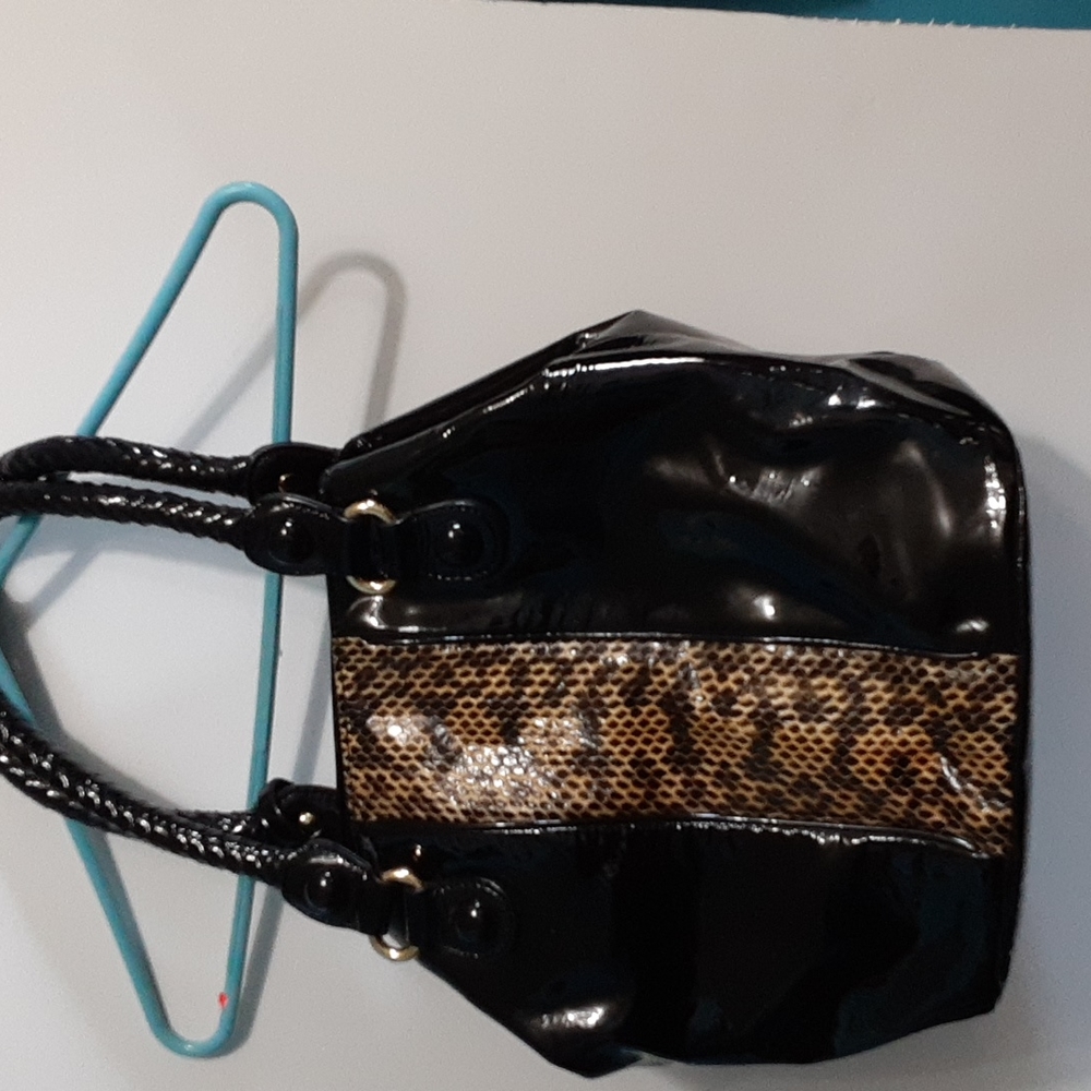 Johnson and Murphy black with snake trim handbag